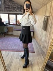 Pleated black skirt with button detail