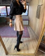 Nude skirt with button detail