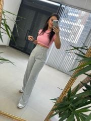 Graue Hose mit GK-Streifen und seitlichen Knöpfen